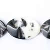 Gemstone beads, white and black stone, wave oval, 13x18mm, Sold per 16-inch Strand