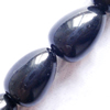 Gemstone beads, black stone, horizontal drilled pear, 6x10mm, Sold per 16-inch Strand 