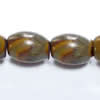 Gemstone beads, fossil jasper, rice, 6x9mm, Sold per 16-inch Strand