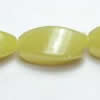 Gemstone beads, lemon jade, twist rice, 8x16mm, Sold per 16-inch Strand