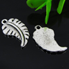 Pendant. Fashion Zinc Alloy jewelry findings. Feather 20x12mm. Sold by Bag
