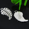 Pendant. Fashion Zinc Alloy jewelry findings. Feather 20x12mm. Sold by Bag