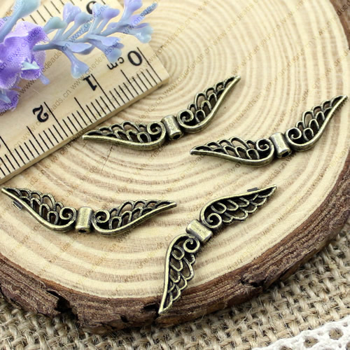 Beads. Fashion Zinc Alloy jewelry findings. Wings 32x8mm. Hole size:1.5mm. Sold by KG