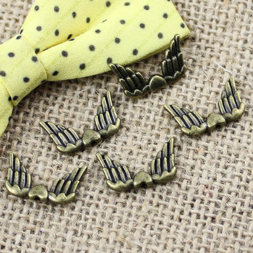 Beads. Fashion Zinc Alloy jewelry findings. Wings 19x12mm. Hole size:1mm. Sold by KG